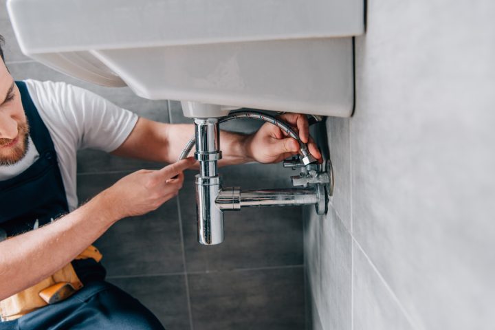 Plumber working, make the most of your plumber's call out fee