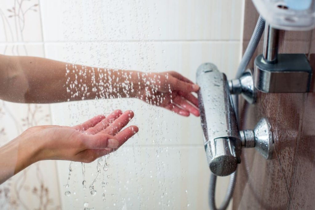 Running the water to heat the shower. Low Flow shower heads can help reduce water heating costs