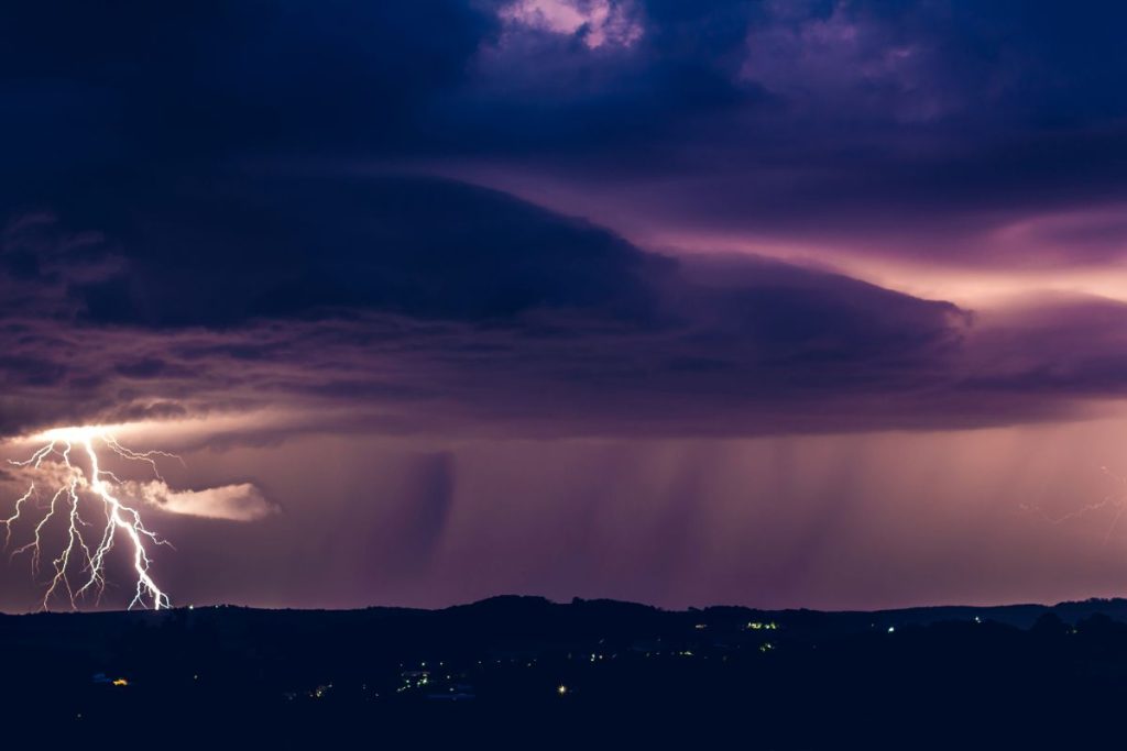 Storm rolling in over city. Brisbane residents need to get plumbing ready for storm season.